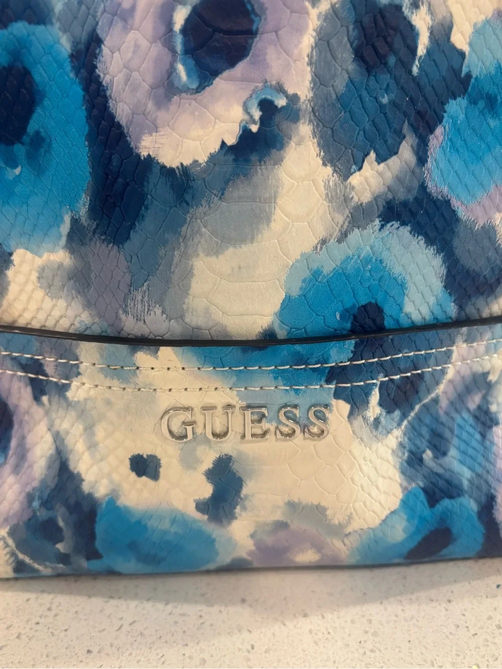 GUESS Blue & White Floral-Print Snakeskin-Textured Tote with Silver Charm
